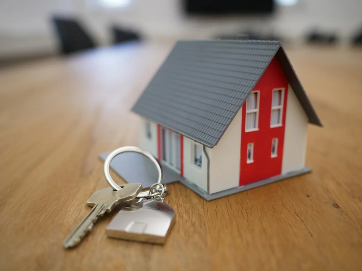 Residential property used to illustrate mortgage assistance for homeowners and land buyers